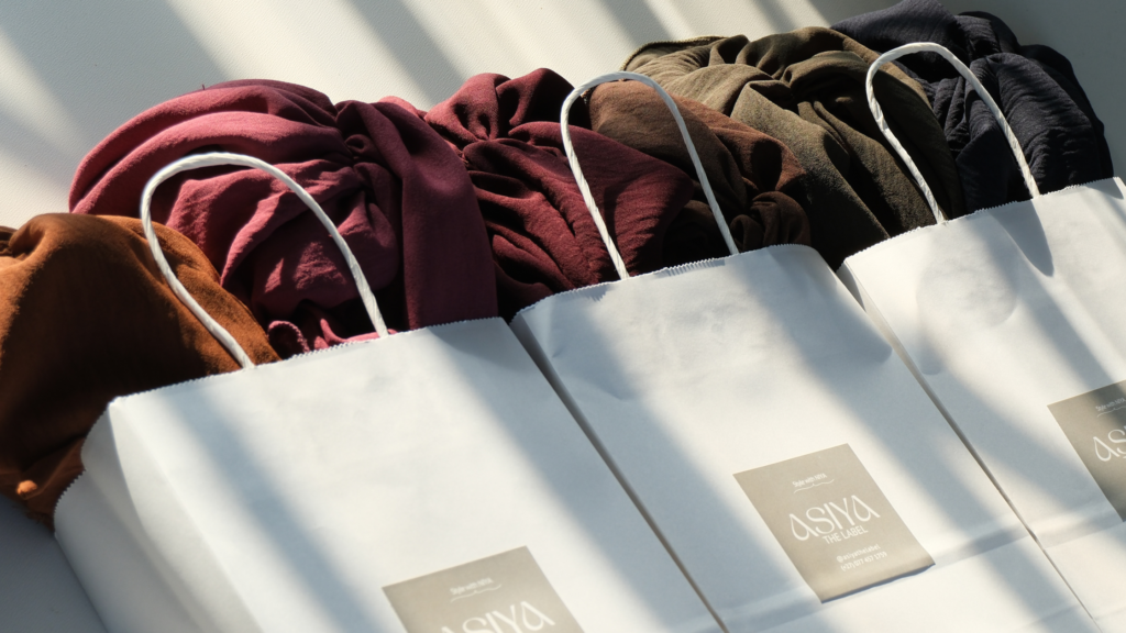Shopping bags and different shades of instant scarves